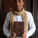 RATOLOJANAHARY Njara Tiana holding a Bible